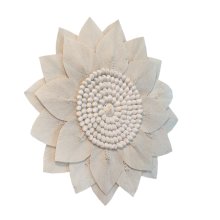 Wall decoration made of cotton leaves and shells