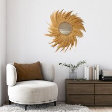 Wall decoration made of grass, rope and mirror
